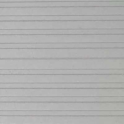 Close up view of a grey finish color swatch sample with horizontal textured lines