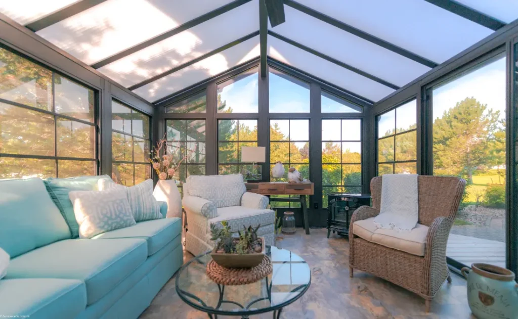 3 season vinyl sunroom with glass windows and comfortable outdoor living space